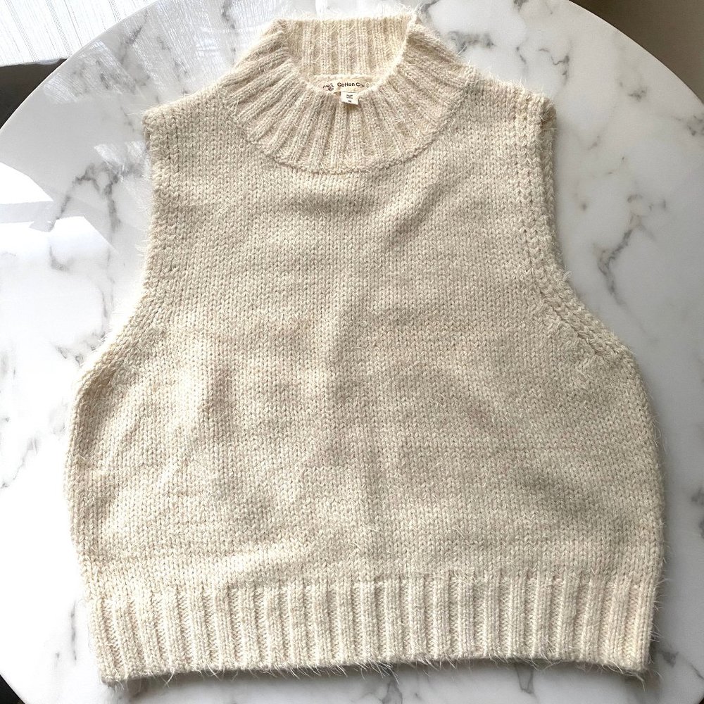 White Sleeveless Mock Neck Sweater
